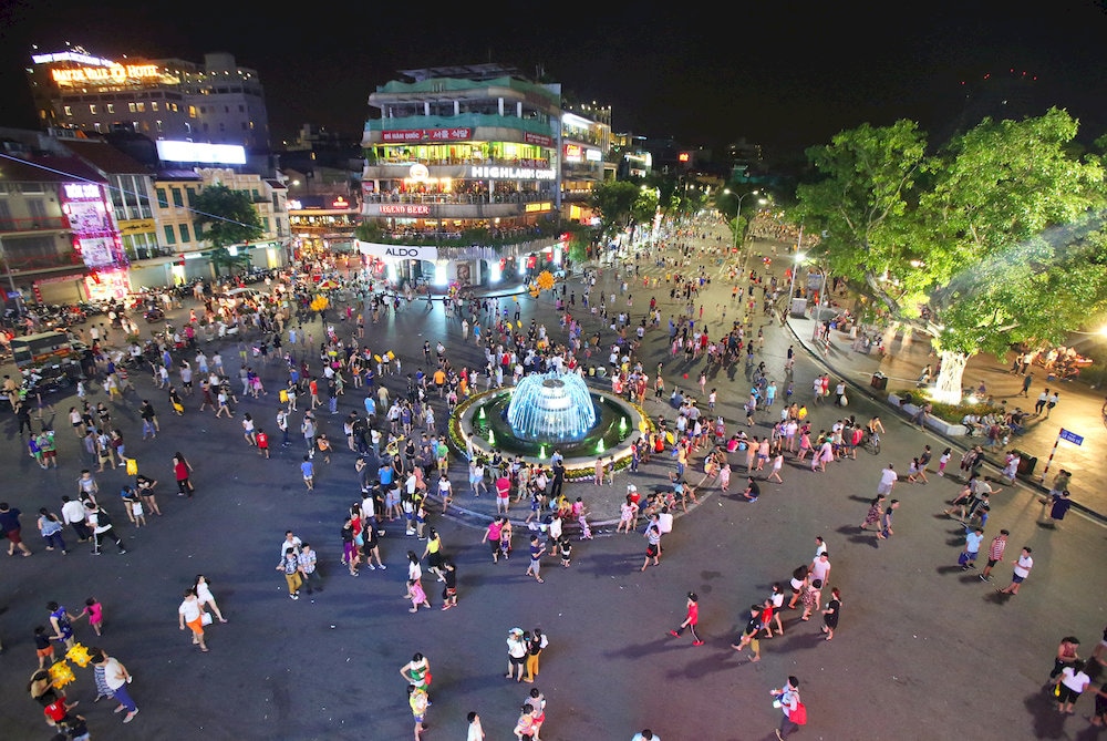 Hoan Kiem Lake transforms into a lively, pedestrian-only area on weekends